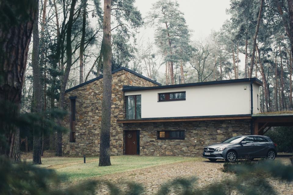 A car parked in a home driveway where a mobile technician would work